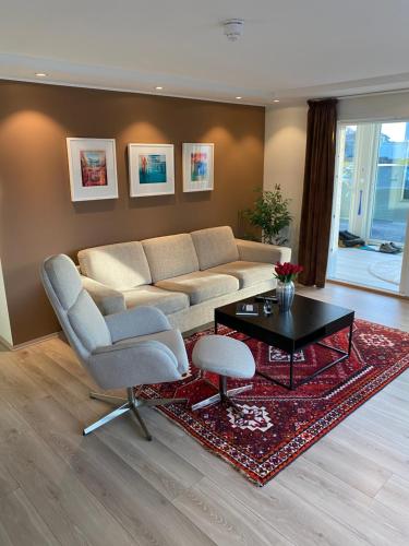 Posezení v ubytování Modern apartment with mountain and sea view