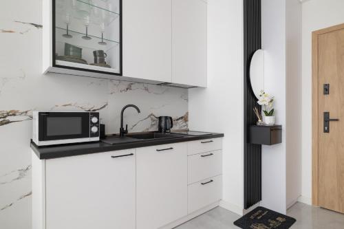Foto Eleganckie Apartamenty Zabrska z Parkingiem w Centrum Katowic Przy Rynku by Noclegi Renters 4