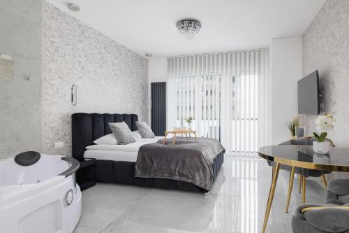 Foto Eleganckie Apartamenty Zabrska z Parkingiem w Centrum Katowic Przy Rynku by Noclegi Renters 2