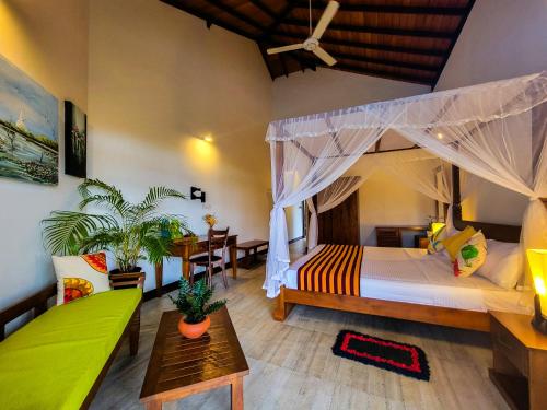 Postel nebo postele na pokoji v ubytování Silent Garden Ayurveda Health Resort