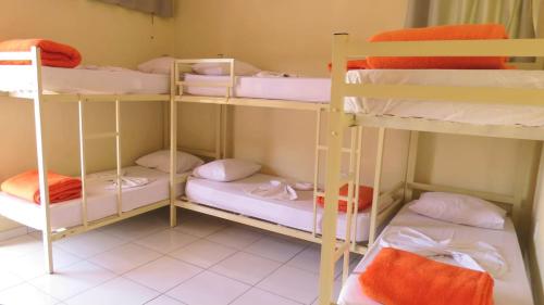 Un ou plusieurs lits dans un hébergement de l'établissement Pousada Lirio do Vale