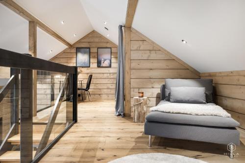 Postel nebo postele na pokoji v ubytování Villa Lumikkomäki A - Arctic Forest Retreat by Hilla Villas