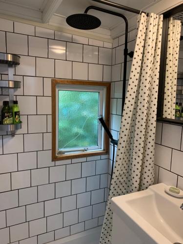 Et badeværelse på Natuurhuisje De Boshut