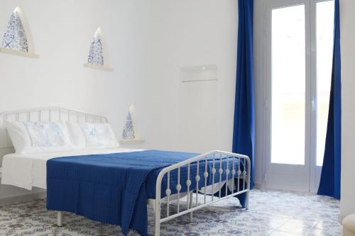 Giường trong phòng chung tại DallaVi rooms