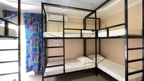 Кровать или кровати в номере O Plácido Arte Hostel