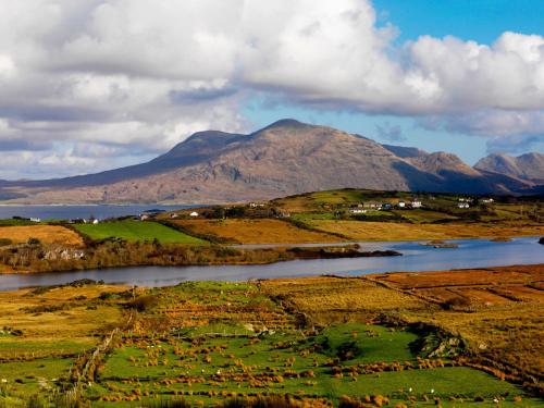 a view of a valley with a river and a mountain at Holiday Home Galway Bay - TR4Lodge by Interhome in Doughiska