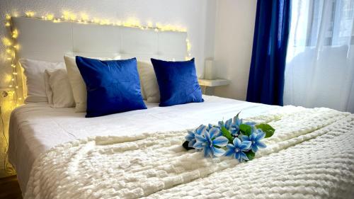 Ένα ή περισσότερα κρεβάτια σε δωμάτιο στο Nacar Golden Sand Beach by Deihu Experiences