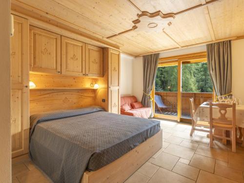 Postel nebo postele na pokoji v ubytování Apartment Residence gli Scoiattoli-4 by Interhome