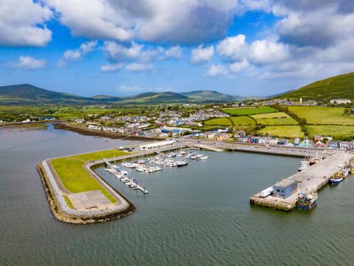 an aerial view of a marina with boats in the water at Holiday Home Dingle Bay View - TR2 by Interhome in Emlagh East
