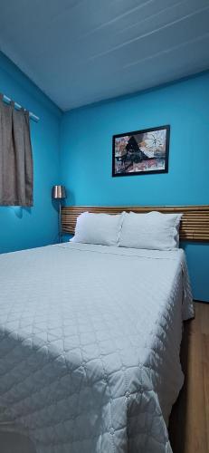 Postel nebo postele na pokoji v ubytování Vida de Ilha