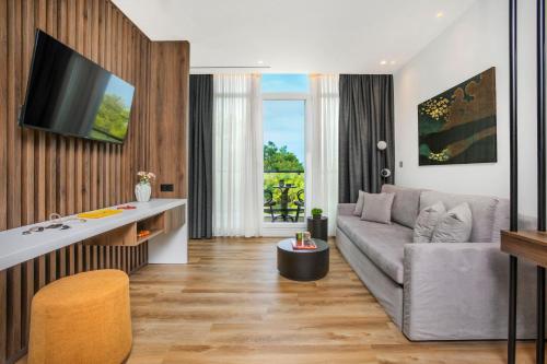 TV a/nebo společenská místnost v ubytování Pefka Hotel