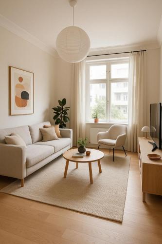 TV a/nebo společenská místnost v ubytování Mayfair Hidden Gem