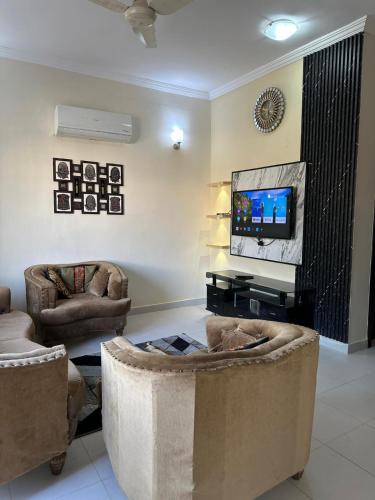 TV a/nebo společenská místnost v ubytování Luxury Villa Upper Portion