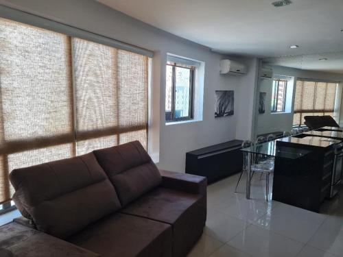 Μια τηλεόραση ή/και κέντρο ψυχαγωγίας στο Flat mobiliado e bem localizado