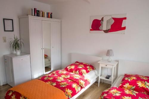 
Ein Bett oder Betten in einem Zimmer der Unterkunft Tasca im Feui Apartments
