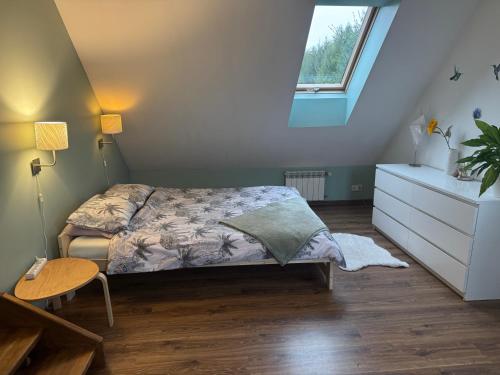 Ένα ή περισσότερα κρεβάτια σε δωμάτιο στο Rysiówka