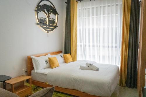 Postel nebo postele na pokoji v ubytování Savannah Residence by Royal Surburbs