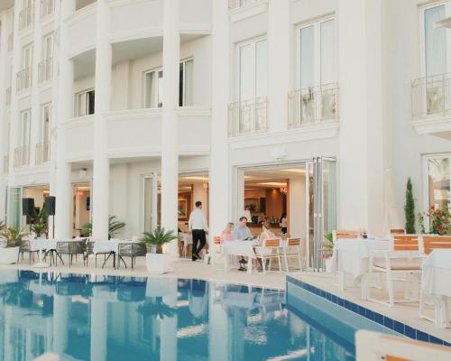 a view of the hotel from the pool at Palace Hotel & SPA in Durrës