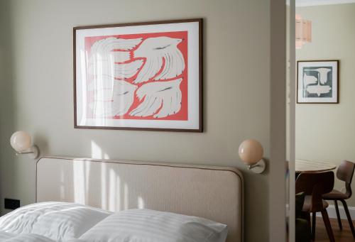 Postel nebo postele na pokoji v ubytování HeyMi Apartments Brick Lane Vienna