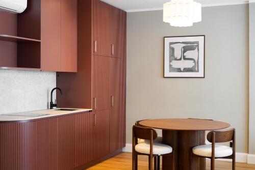 Kuchyň nebo kuchyňský kout v ubytování HeyMi Apartments Brick Lane Vienna