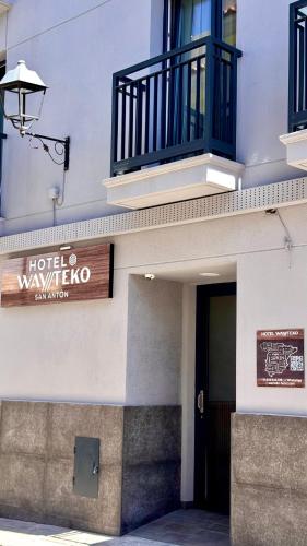 a hotel waikiki sign on the side of a building at Hotel Wayteko San Antón in Alicante
