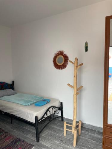 Postel nebo postele na pokoji v ubytování Ocean Jam Surf House