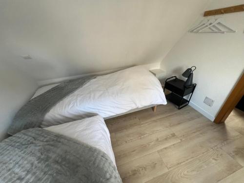 En eller flere senge i et værelse på Charmante maison de ville "Le 1998"