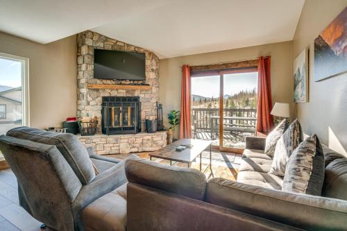 a living room with a couch and a fireplace at Multi-Level Haven 3 Mi to Lake Dillon in Silverthorne
