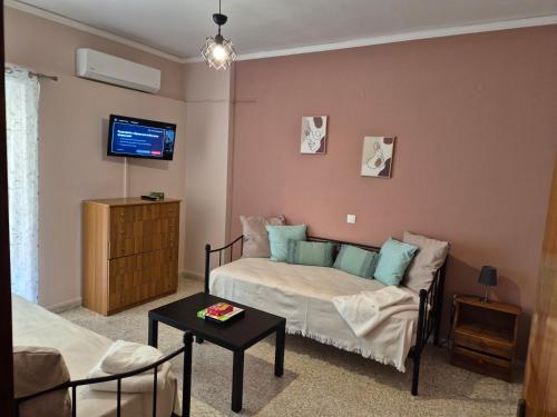 Postel nebo postele na pokoji v ubytování Lilia Apartments