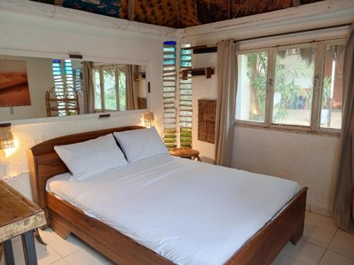 Postel nebo postele na pokoji v ubytování La CASA