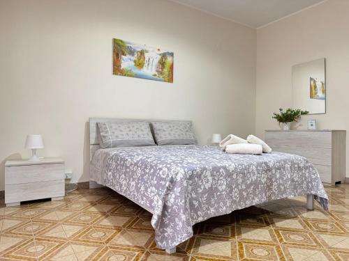 Ένα ή περισσότερα κρεβάτια σε δωμάτιο στο Alba Vesuviana B&B