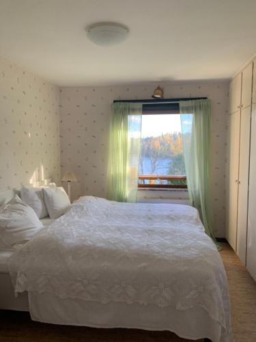 Ένα ή περισσότερα κρεβάτια σε δωμάτιο στο Lakeview Villa