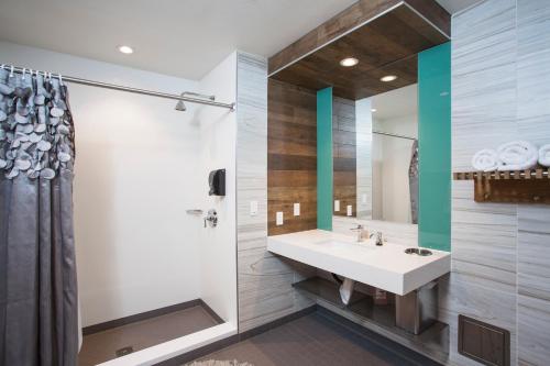 a bathroom with a sink and a mirror at HI Los Angeles Santa Monica Hostel in Los Angeles