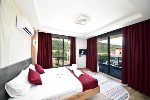 Postel nebo postele na pokoji v ubytování Villa Belmora Villa Asgora