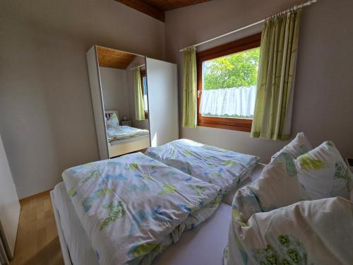 Ένα ή περισσότερα κρεβάτια σε δωμάτιο στο Ferienhaus Strandperle Simonsberg Husum Nordsee Meer