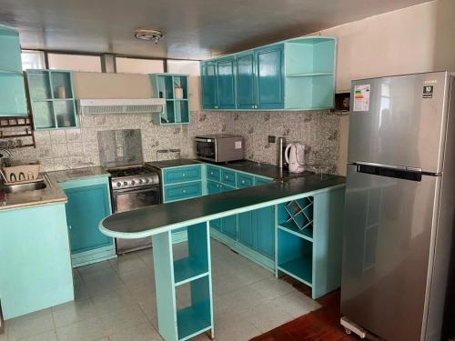 Η κουζίνα ή μικρή κουζίνα στο Departamento full amoblado centro de Cusco