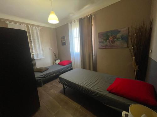 Llit o llits en una habitació de La Maioun