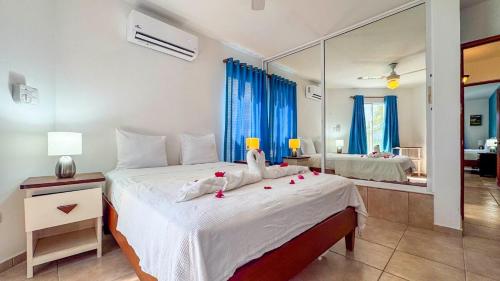 Giường trong phòng chung tại Renaissance Residence Cabarete