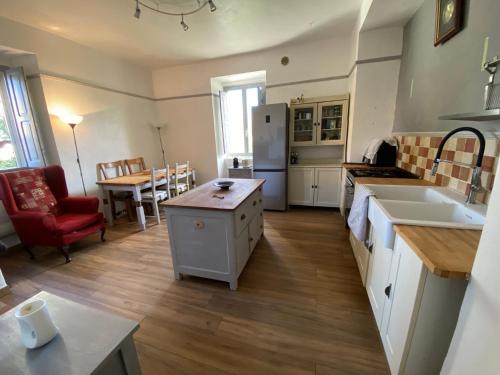 a kitchen with a sink and a counter top at CASA VACANZA Dimora del tempo in Fara San Martino