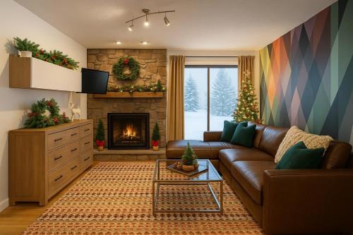 a living room with a couch and a fireplace at Beaver Creek 2 Bed 2 Bath Condo 1 MIN Walk to Elk Lot in Avon