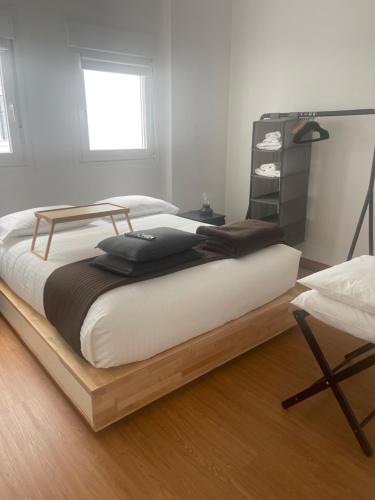 Кровать или кровати в номере RT74 Calle Rodrigo de Triana con opción de parking