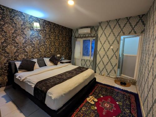 Postel nebo postele na pokoji v ubytování Luna Hotel & Lounge