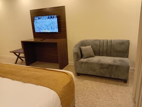 TV a/nebo společenská místnost v ubytování مجمع مهنا