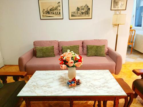 Coin salon dans l'établissement Home Sweet Home No1