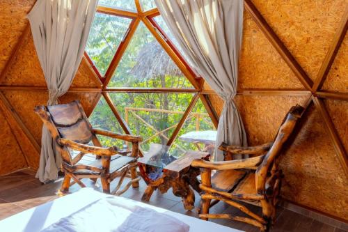 Posezení v ubytování Los Glampings De Taytamaki