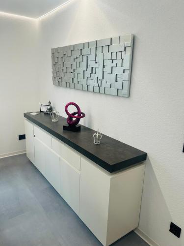 Kuchyň nebo kuchyňský kout v ubytování Modernes ruhiges Appartement mitten in Bad Rappenau