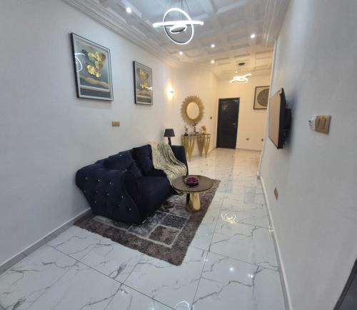 Χώρος καθιστικού στο Une chambre salon avec cuisine