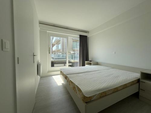 Voodi või voodid majutusasutuse Stylish 3-bedroom apartment with sea view toas