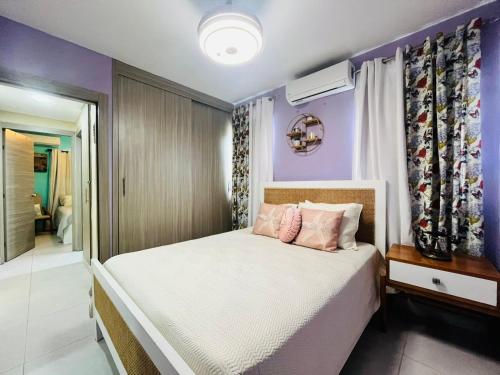 Postel nebo postele na pokoji v ubytování Affordable and Comfy Condo at Punta Cana
