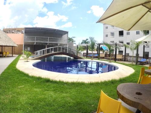 Πισίνα στο ή κοντά στο Flat Tapajós Alter 2 quartos, cozinha, climatizado, wifi 200mbps, estacionamento e self check-in